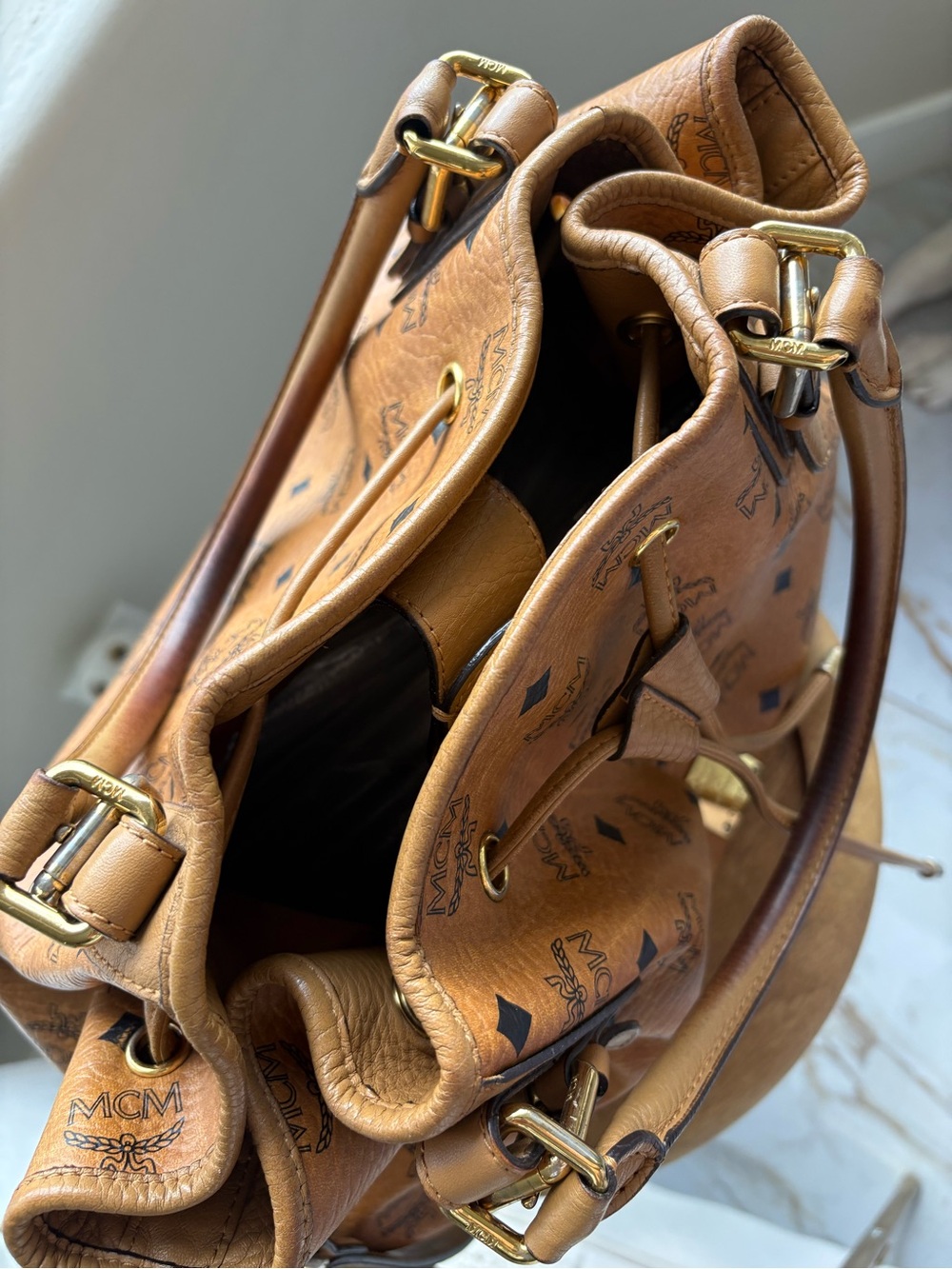 Gorgeous MCM Cognac Visetos Drawstring Shoulder Leather Bag with Gold Hardware - Picture 5 of 13